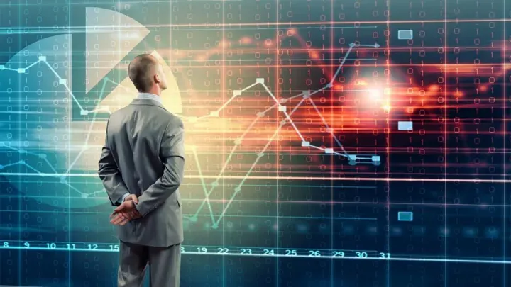 A person looking at a graph of a futures contract, showing the underlying asset's price movements